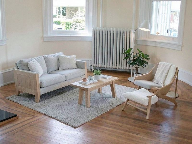 An empty living room, then the same room staged in Scandinavian style